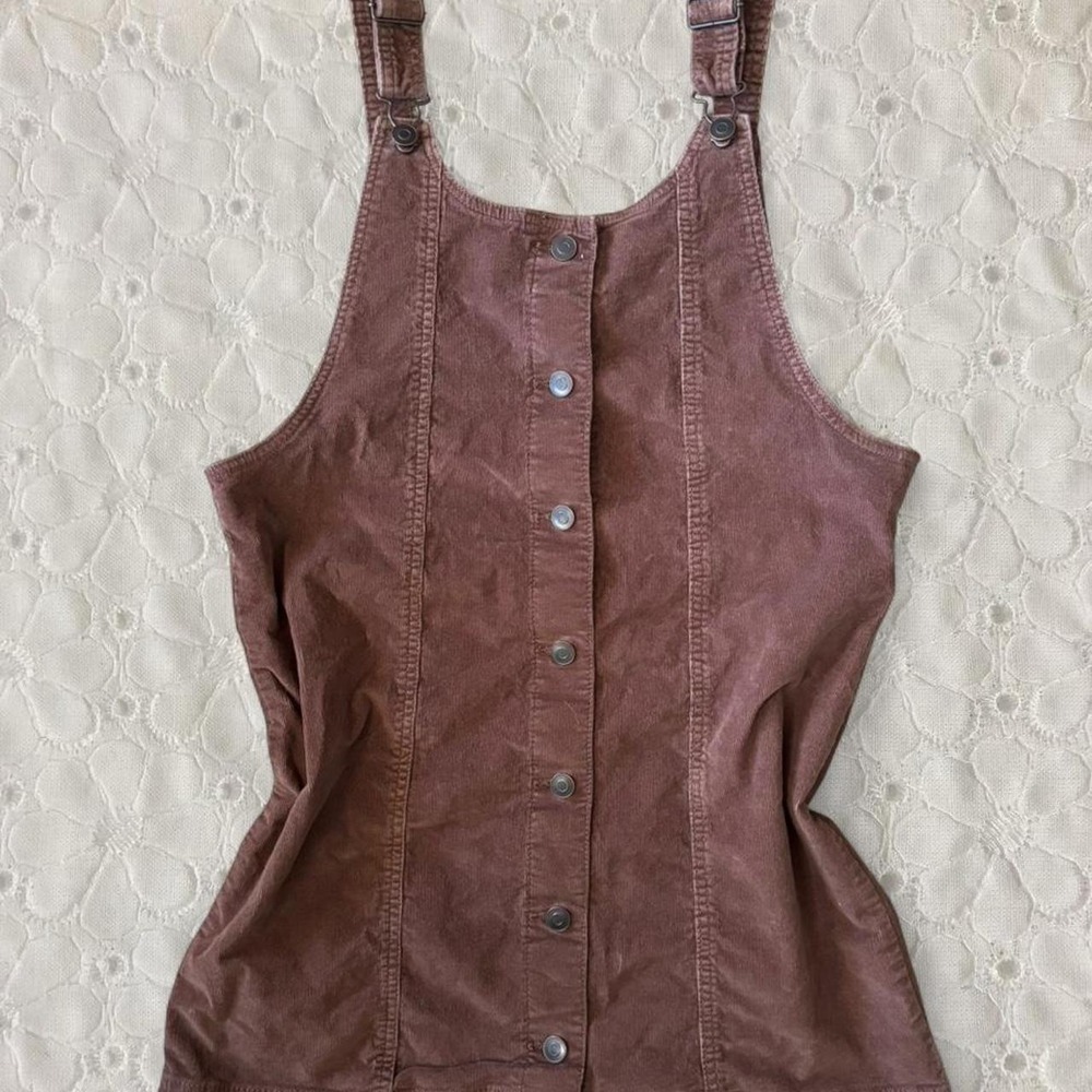 Large brown corduroy button up overalls dress with adjustable straps